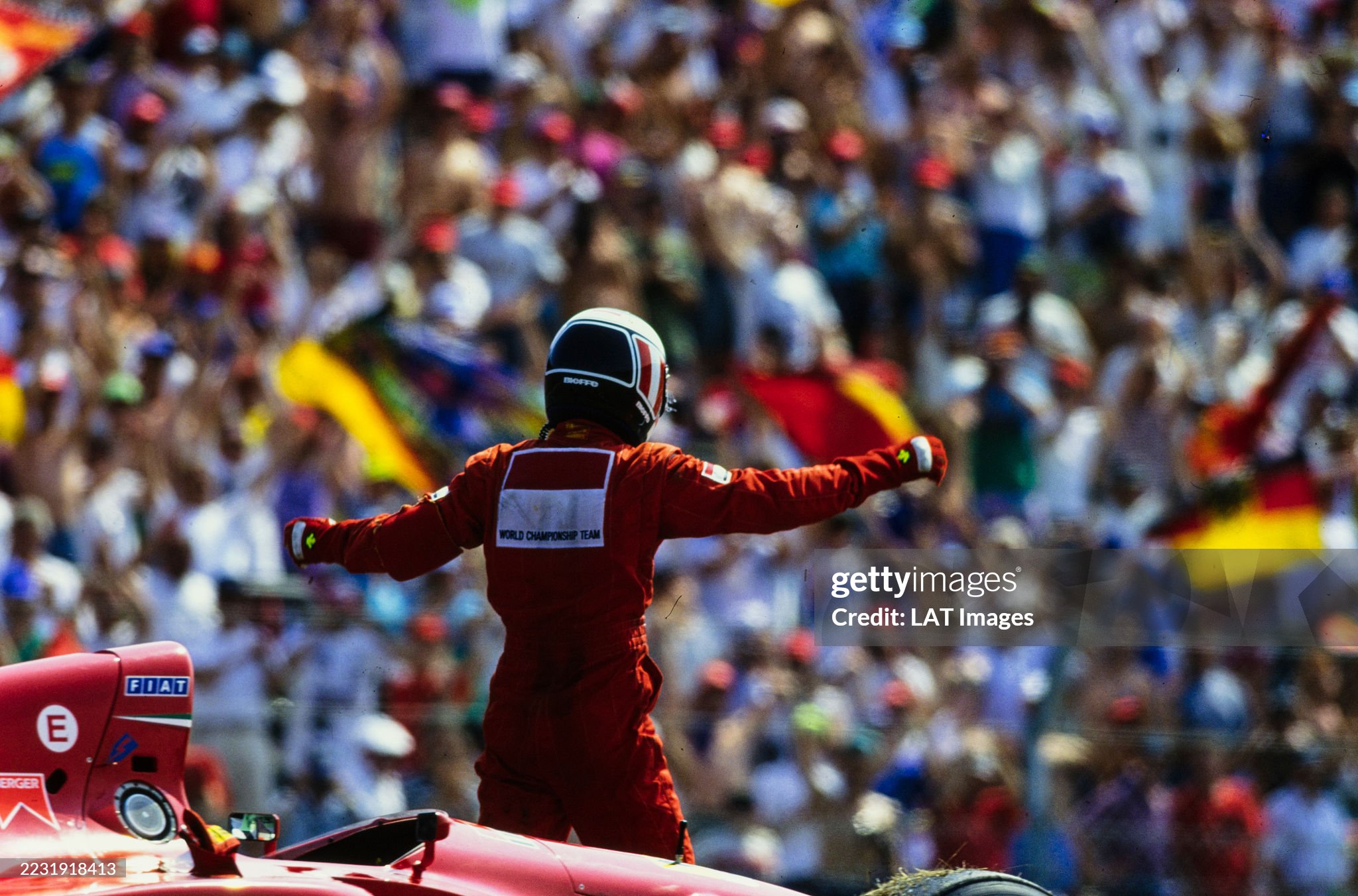 Gerhard Berger, Ferrari 412T1, celebrates victory of the German Grand Prix at Hockenheimring on 31 July 1994. 