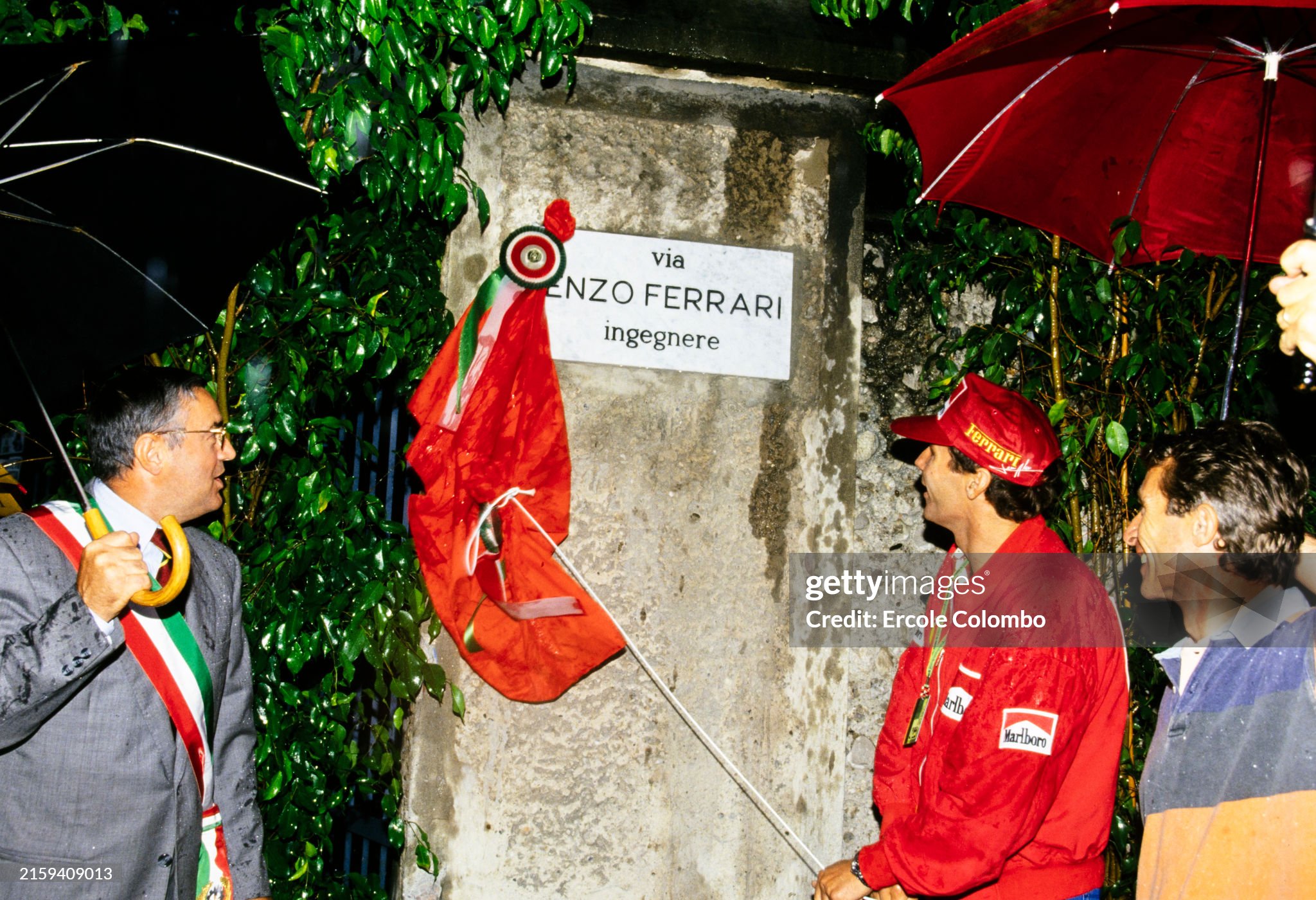 Gerhard Berger unveils a plaque for the renaming of a street in Enzo Ferrari's honour during the Italian Grand Prix at Autodromo Nazionale Monza on 11 September 1994. 