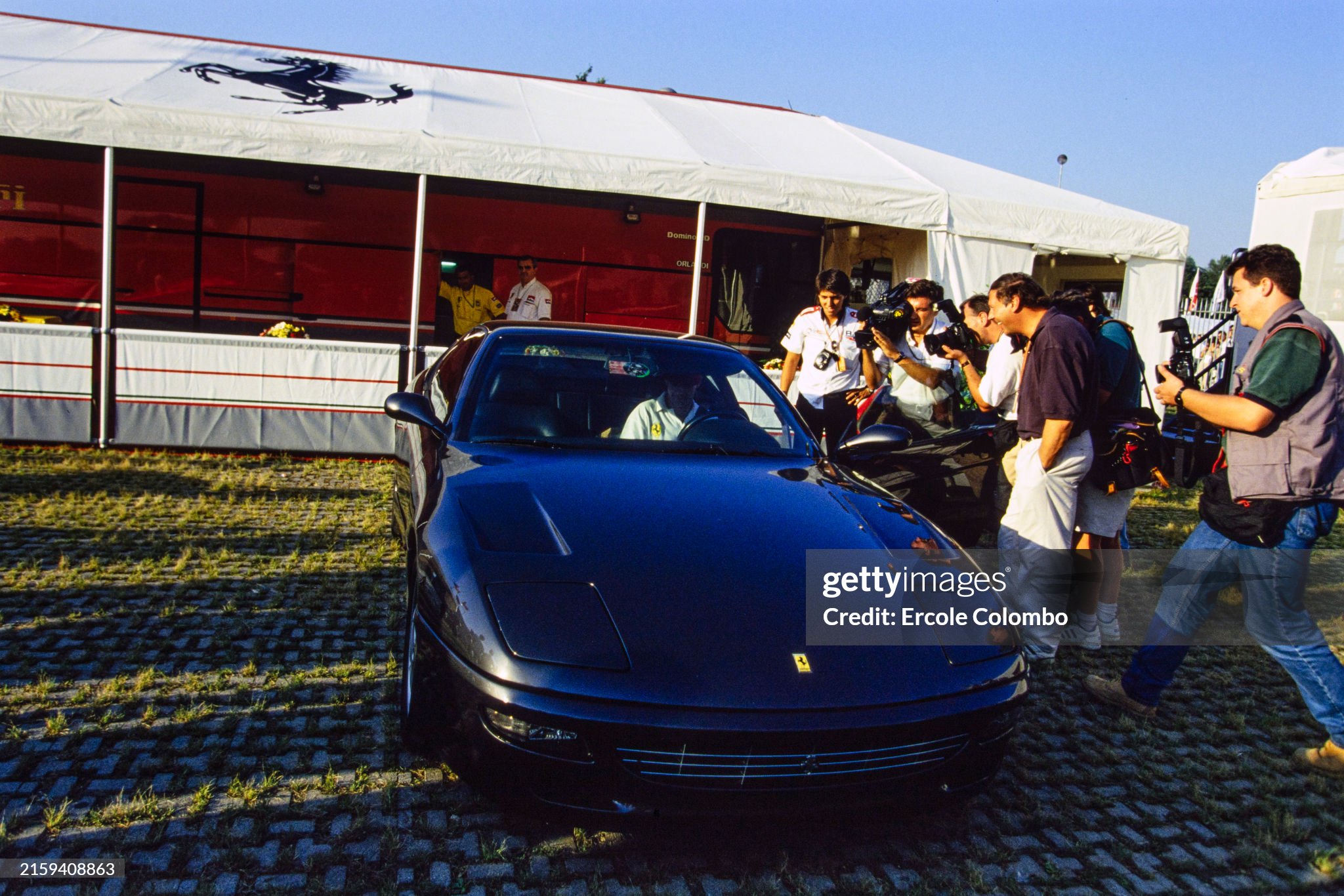 Gerhard Berger prepares to leave the circuit in his Ferrari road car at the Italian Grand Prix in Monza on September 11, 1994. 
