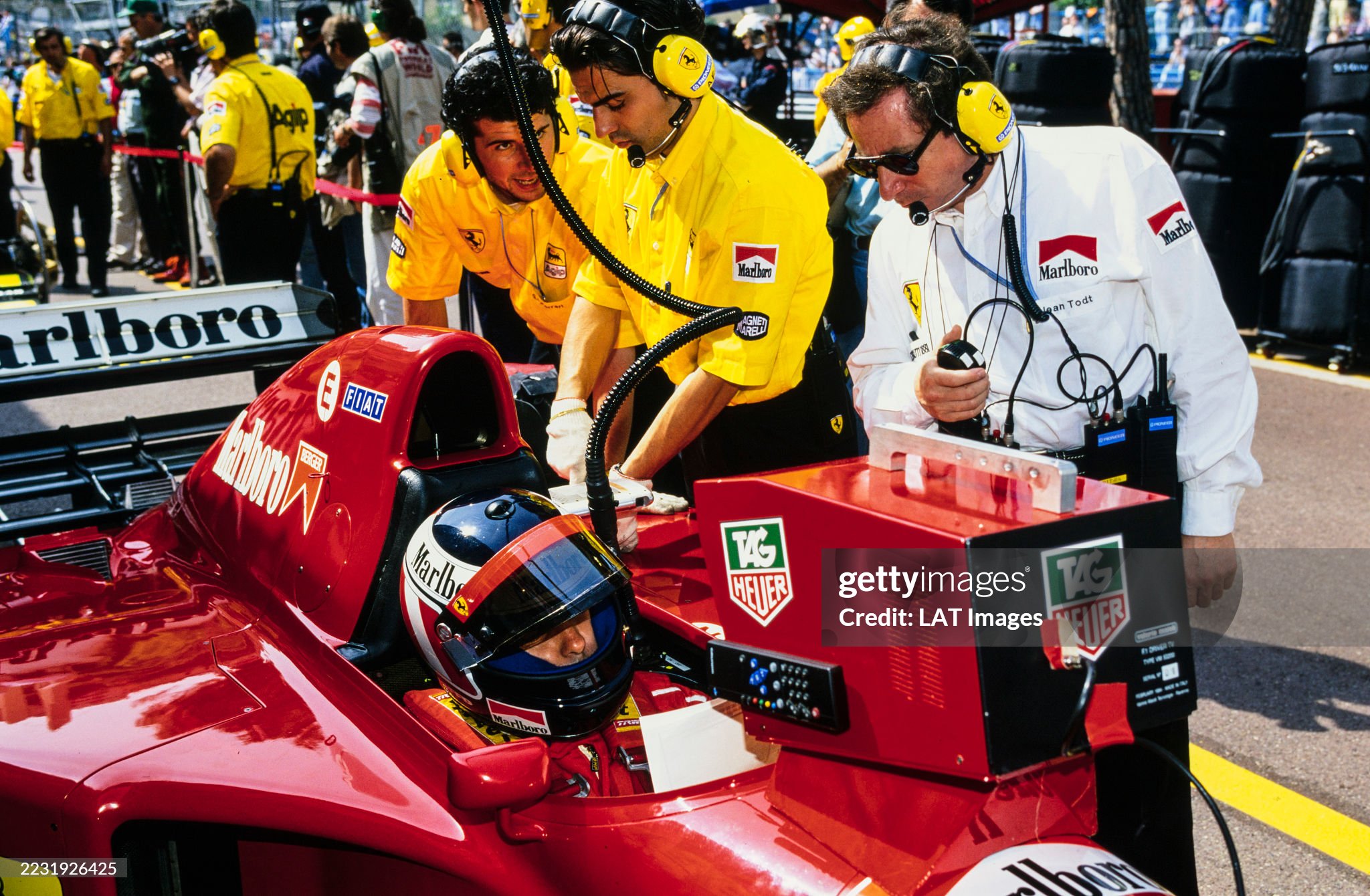 Gerhard Berger sits in his Ferrari 412T2 as Jean Todt looks on during the Monaco Grand Prix at Monte Carlo on 28 May 1995. 