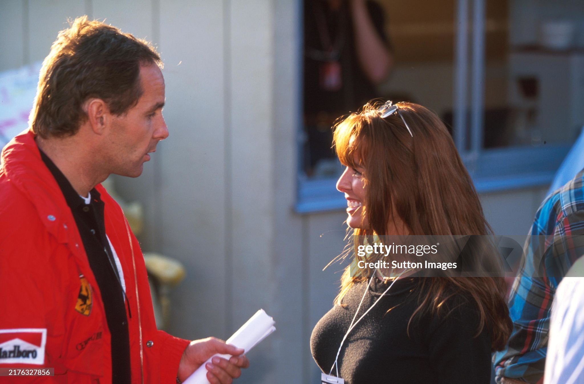Gerhard Berger seems to be suitably impressed by a woman at the Japanese Grand Prix in Suzuka on 29 October 1995. 