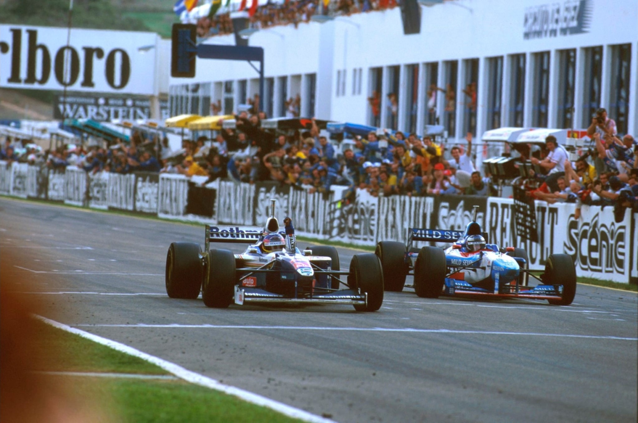 The last chequered flag for Gerhard Berger, Benetton, in 1997.