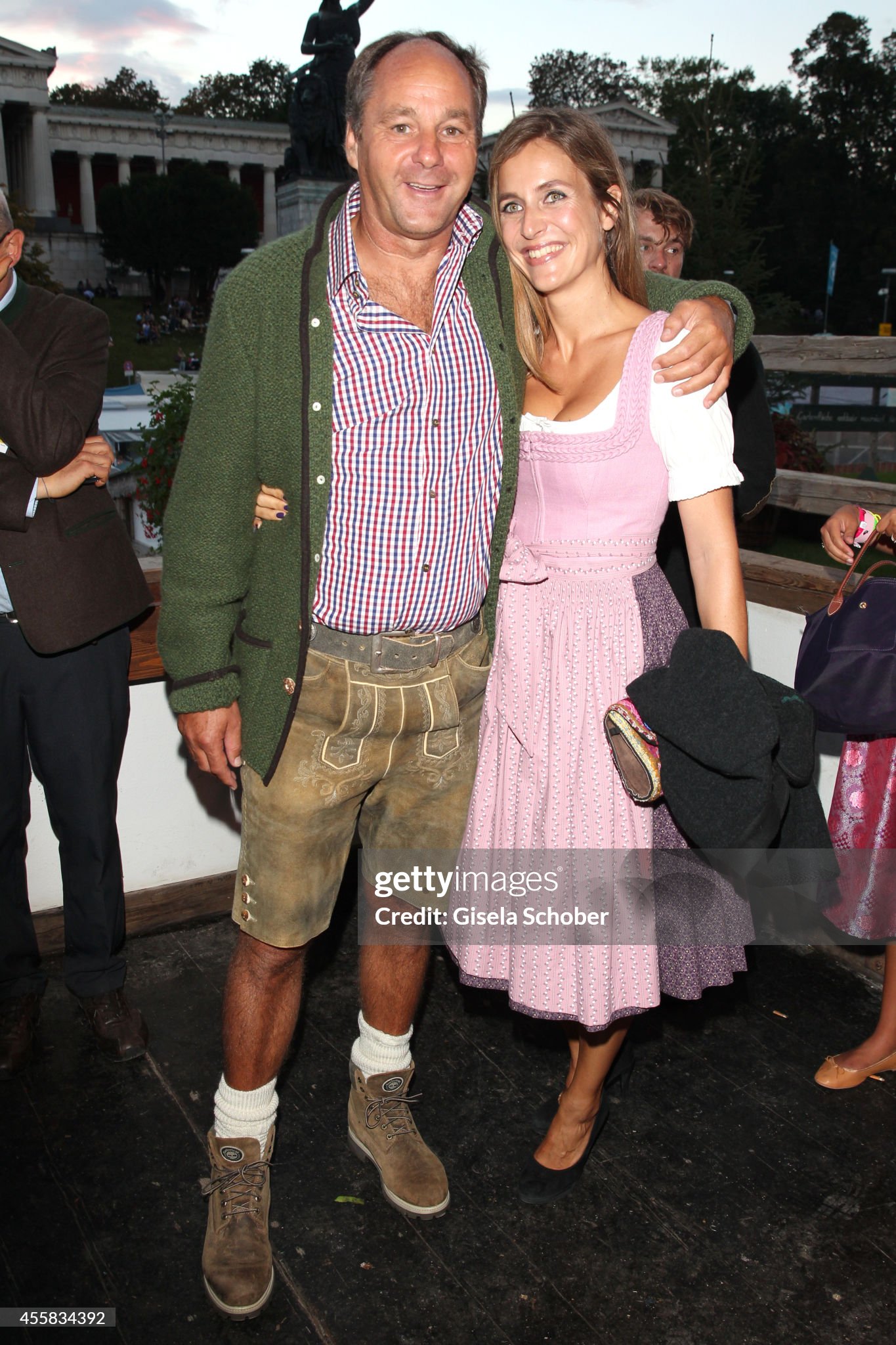 Gerhard Berger and his girlfriend Helena during the Oktoberfest Opening on 20 September 2014 in Munich, Germany. 