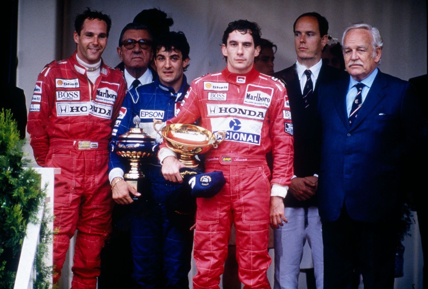 Gerhard Berger on the podium with Ayrton Senna and Jean Alesi in Monte Carlo in 1990.