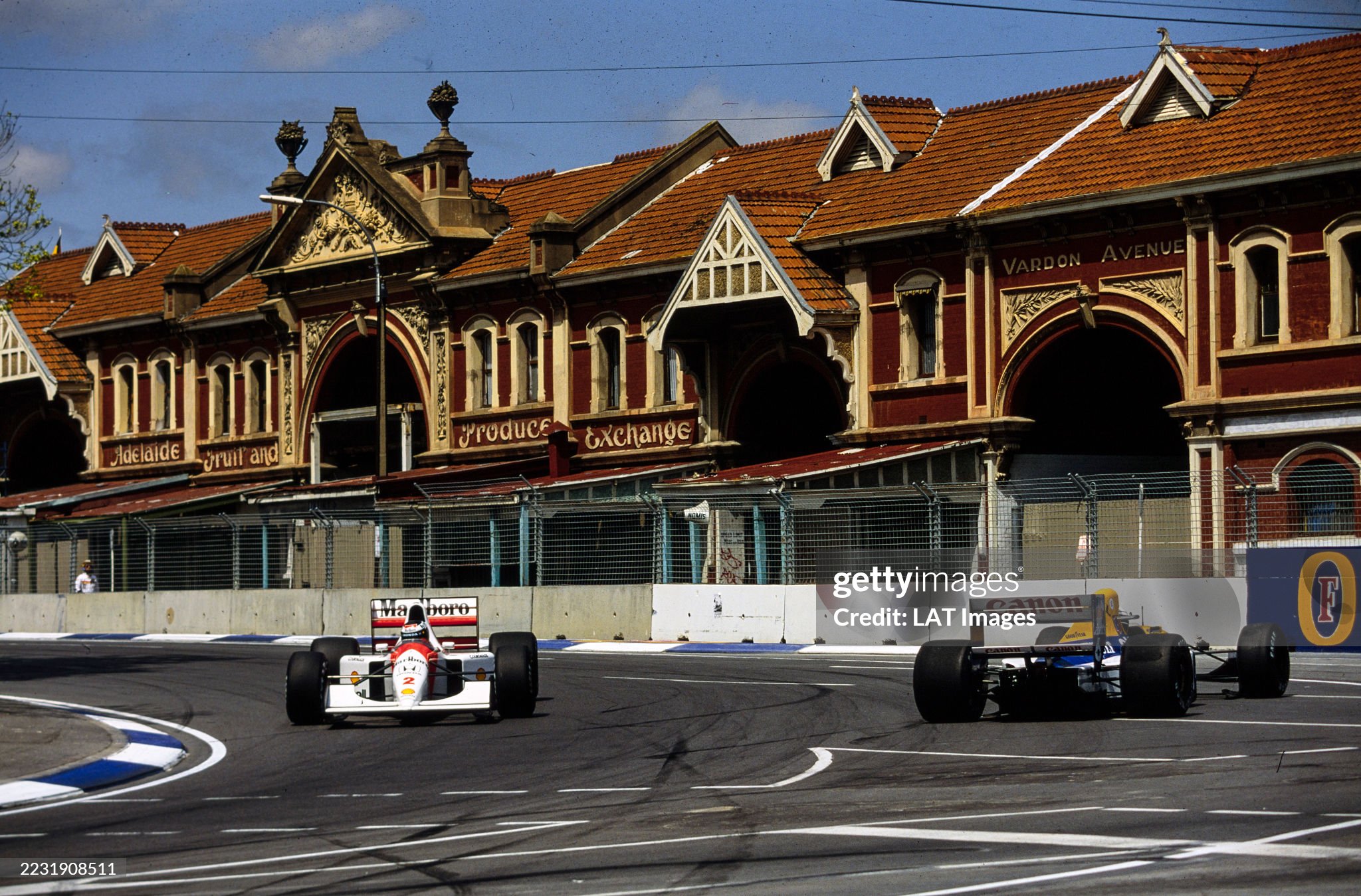 Gerhard Berger, McLaren MP4-7A Honda, passes Riccardo Patrese, Williams FW14B Renault, who has spun during the Australian Grand Prix at Adelaide Street Circuit on 08 November 1992. 