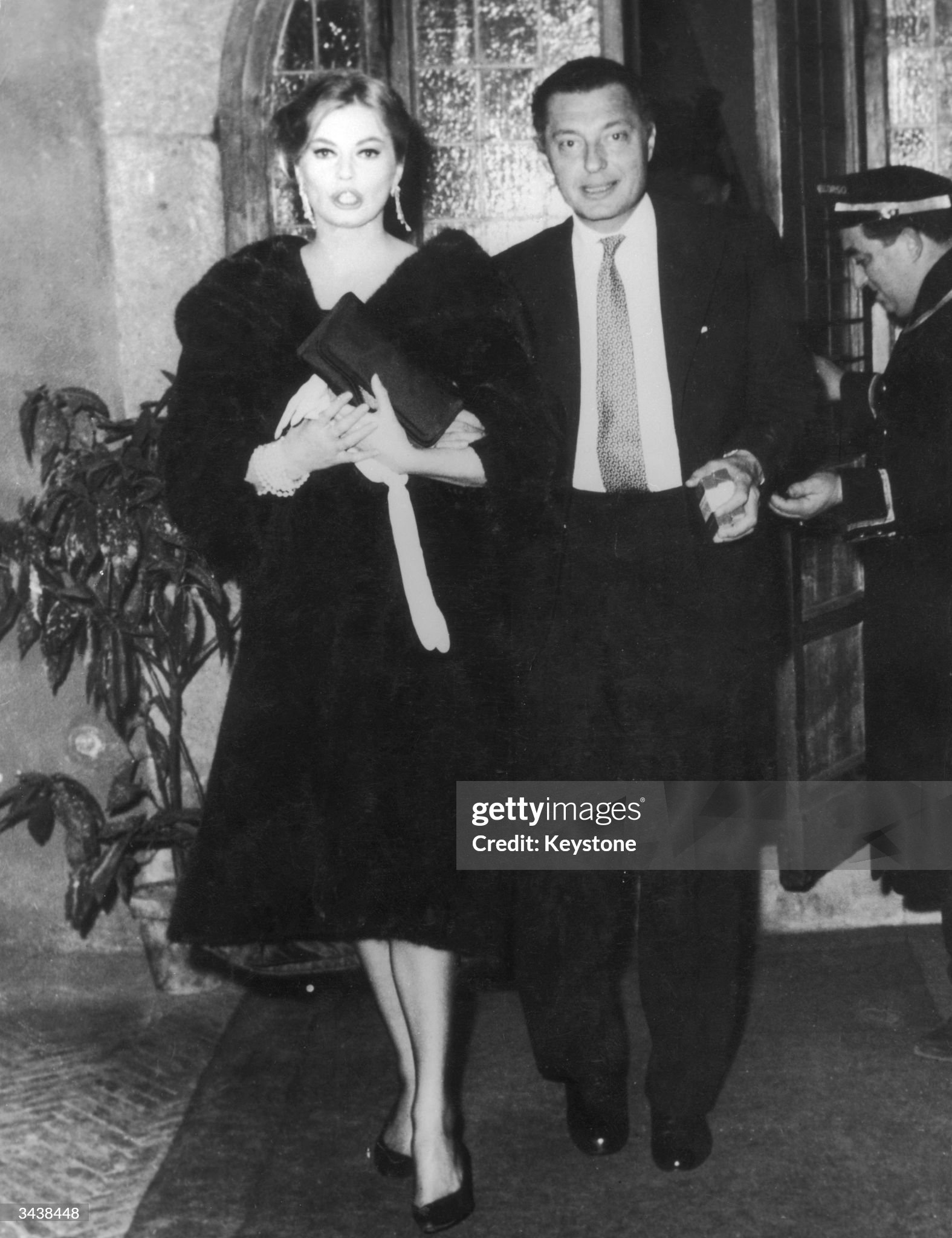 Gianni Agnelli and Swedish film star Anita Ekberg step out of Hostaria dell’Orso, deep in the heart of Rome, on 02 February 1959 at 3 in the morning. 