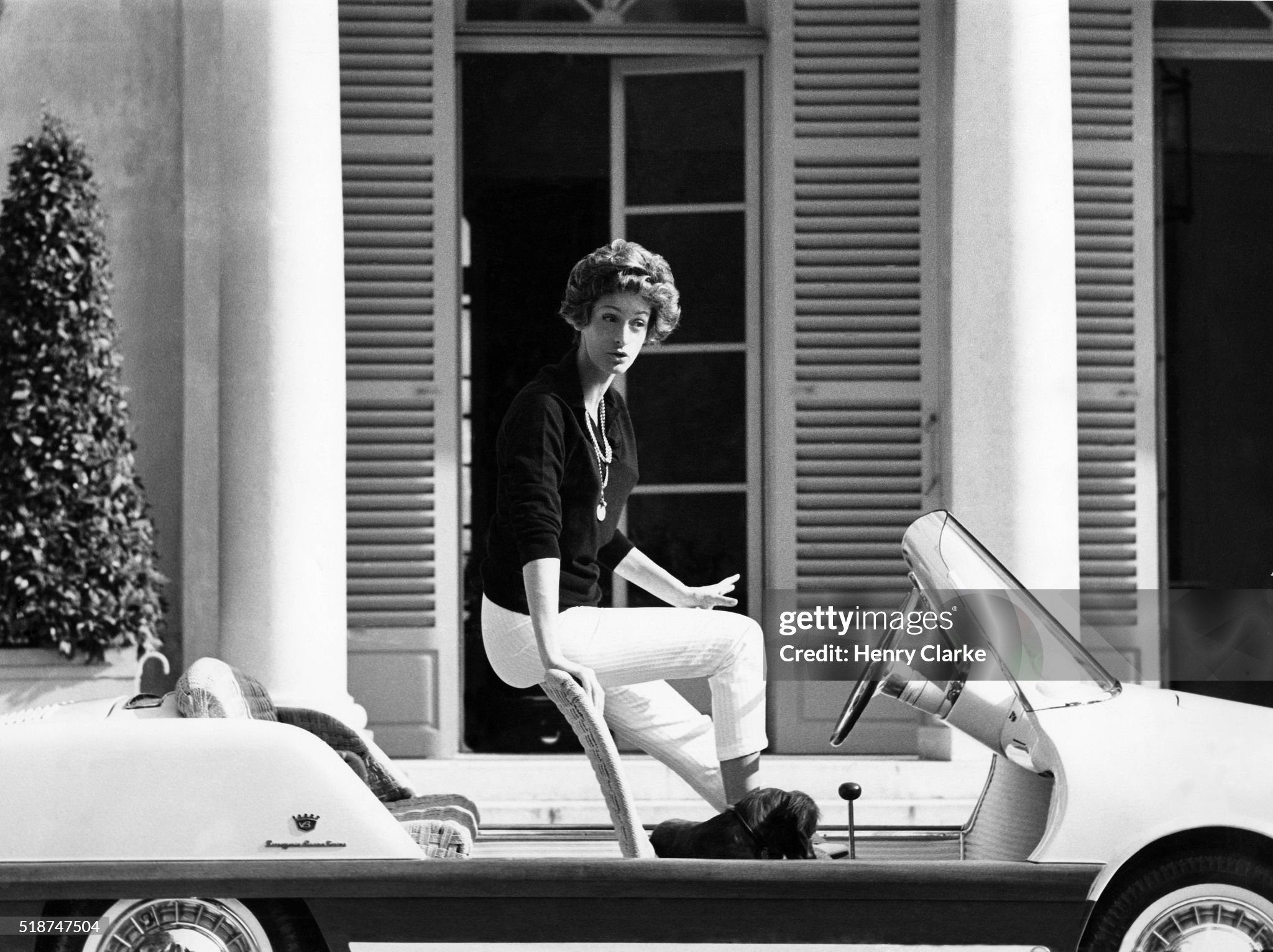 Marella Agnelli getting into her small convertible Fiat at Leopolda, her villa on the French Riviera. 