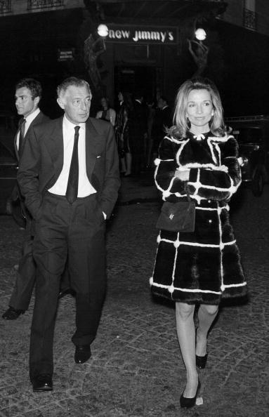 Giovanni Agnelli walking with a woman.