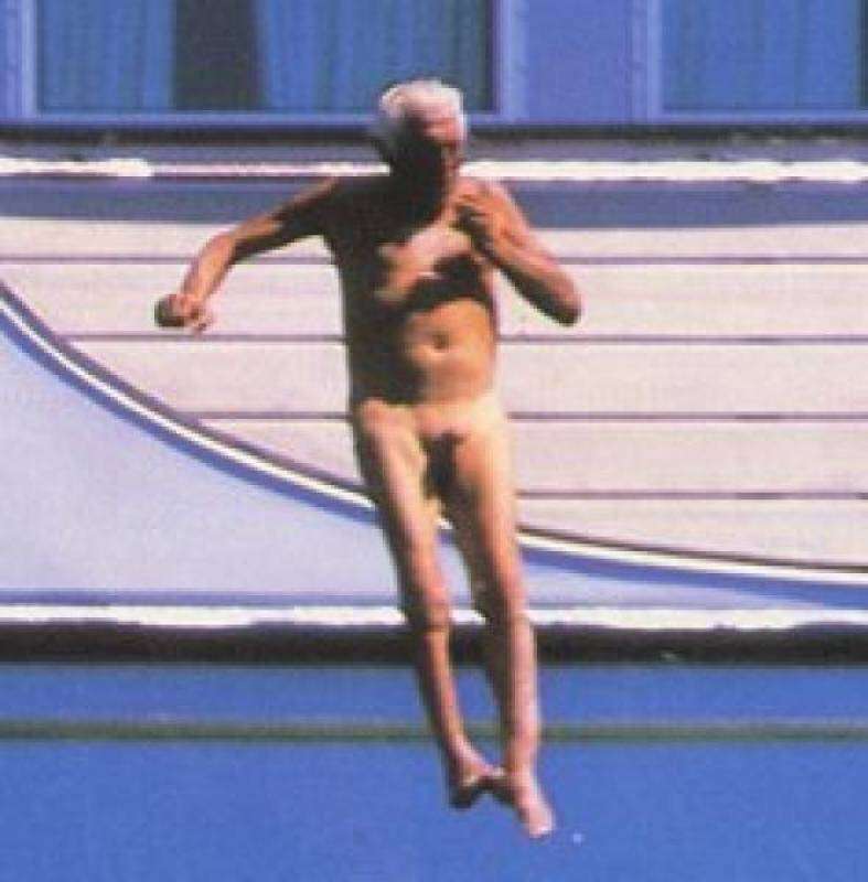 Gianni Agnelli, as is his habit, dives into the sea naked.