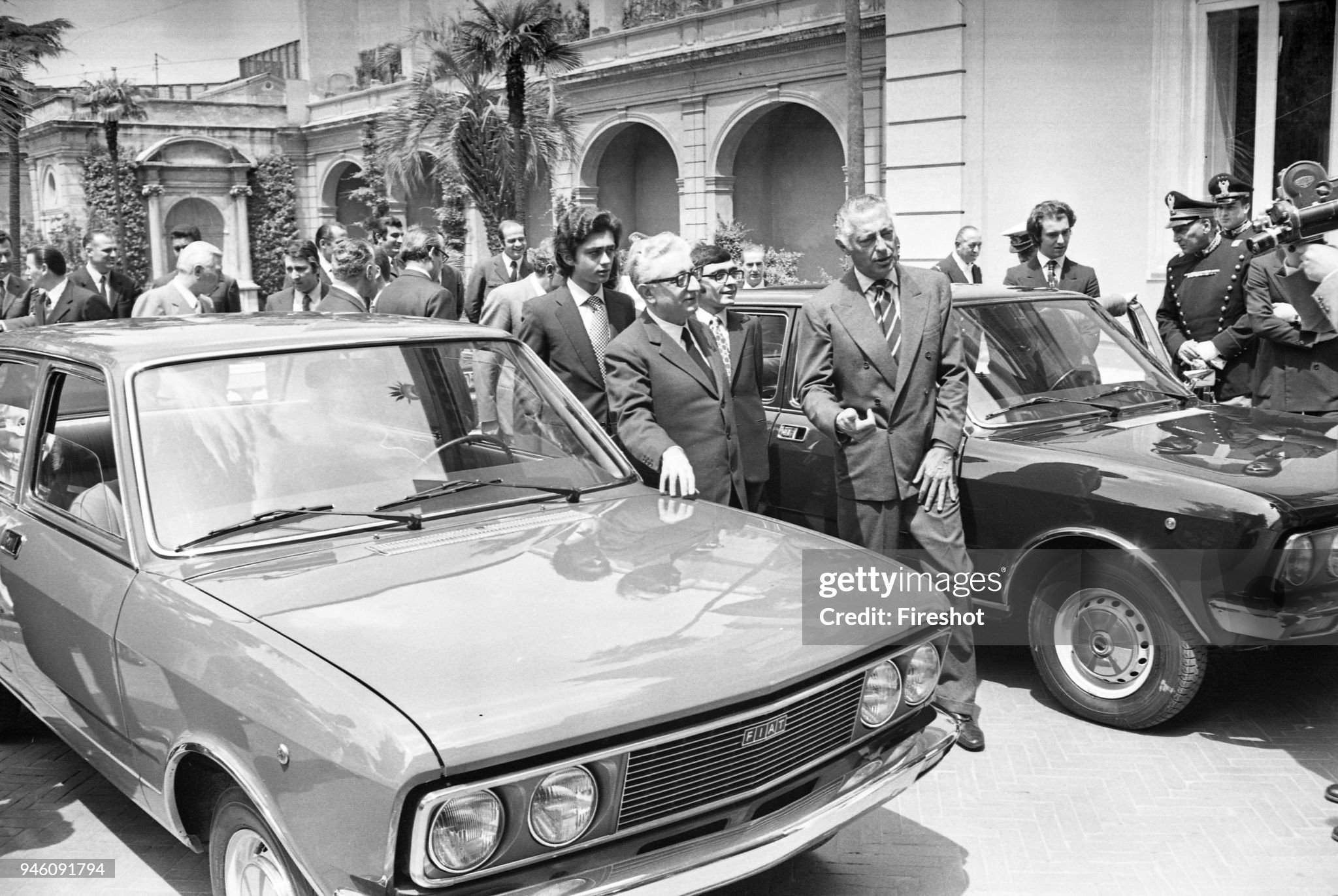 Avv Gianni Agnelli present a new Fiat product 125 to Italian President Leone. 