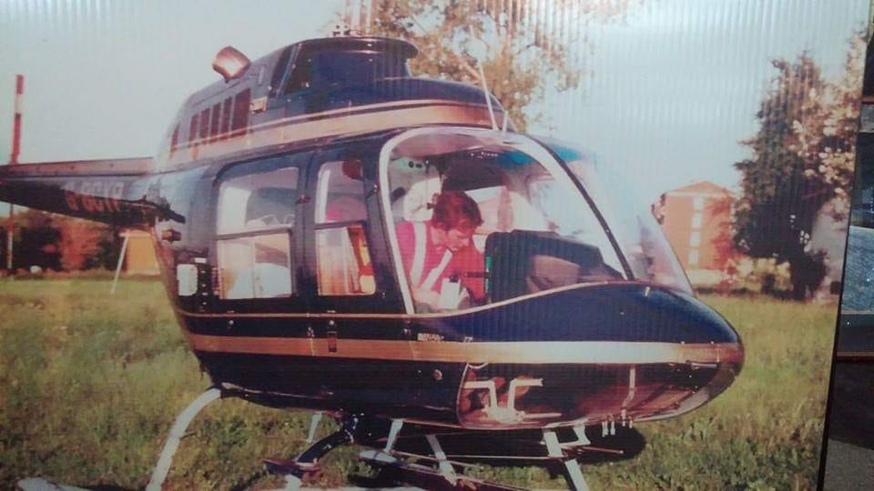 Gilles Villeneuve ready to fly Walter Wolf's helicopter. 