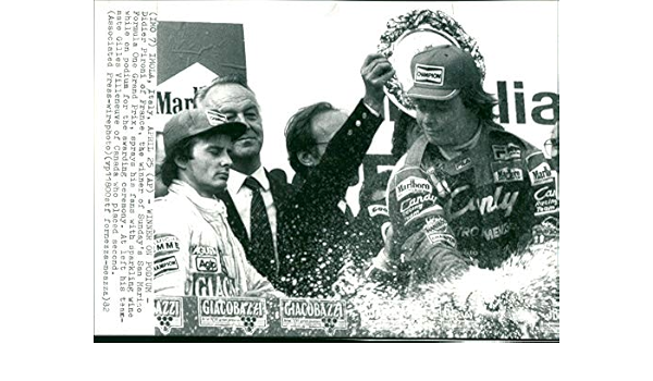 Gilles Villeneuve and Didier Pironi on the podium at the Imola Grand Prix on 25 April 1982.