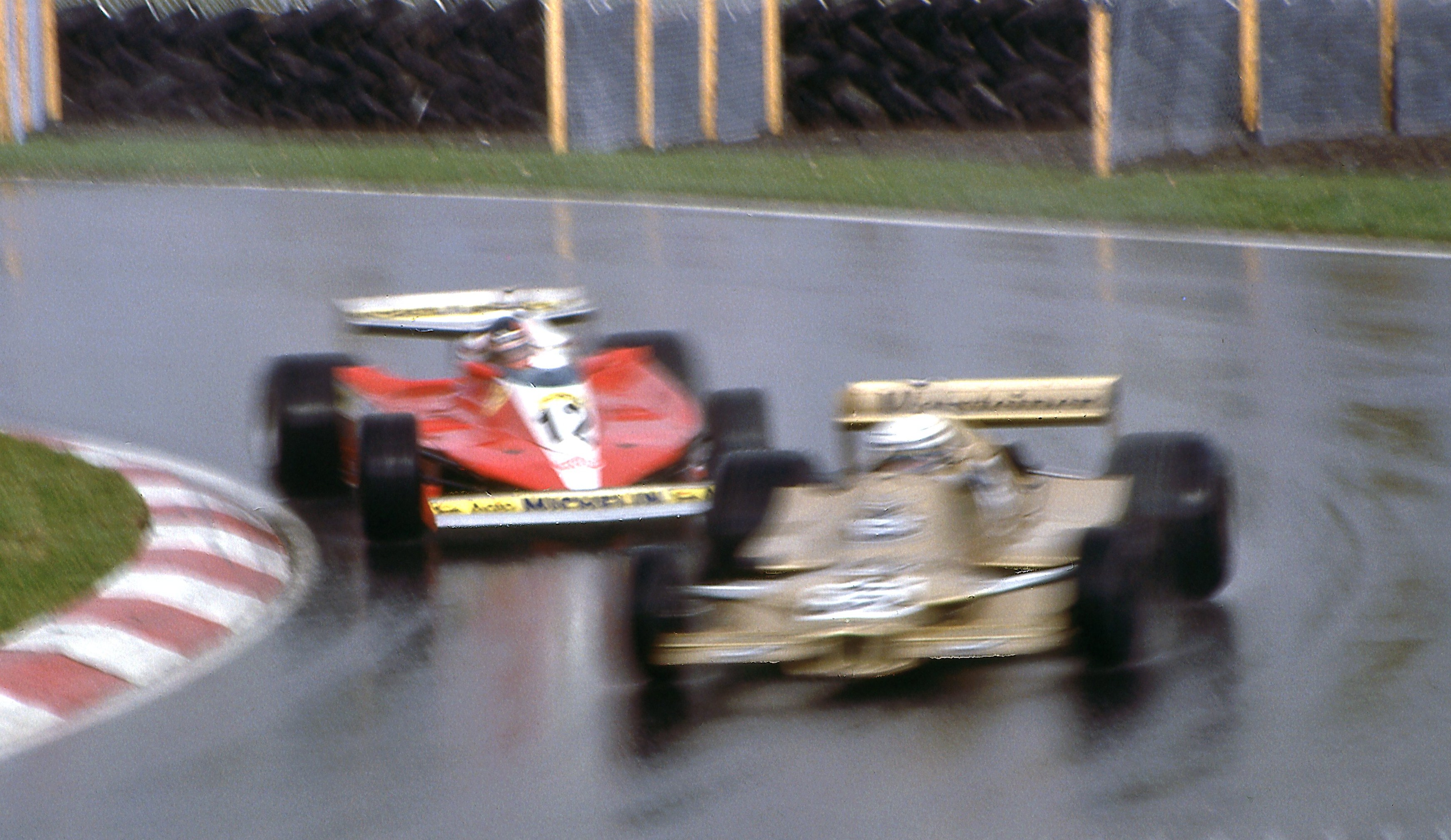 Gilles Villeneuve in his Ferrari 312 T3 fighting with an Arrows.