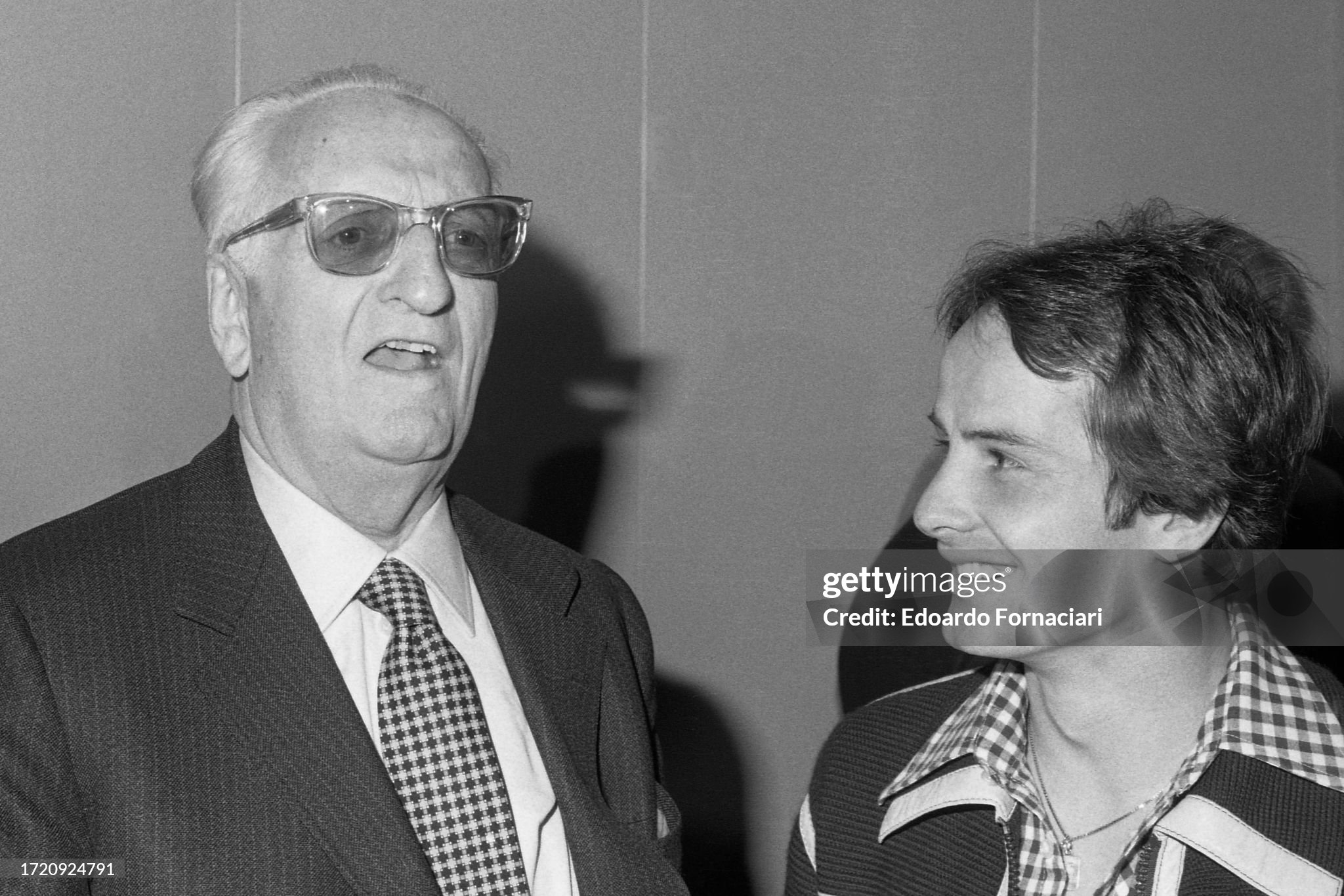 Enzo Ferrari with Gilles Villeneuve, considered to be one of his favourite drivers for his team, during the unveiling of Ferrari's new 312 T3 car, Maranello, Modena, Italy, 12 November 1977. 