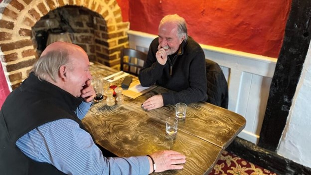 Roebuck, left and Maurice Hamilton sharing memories.