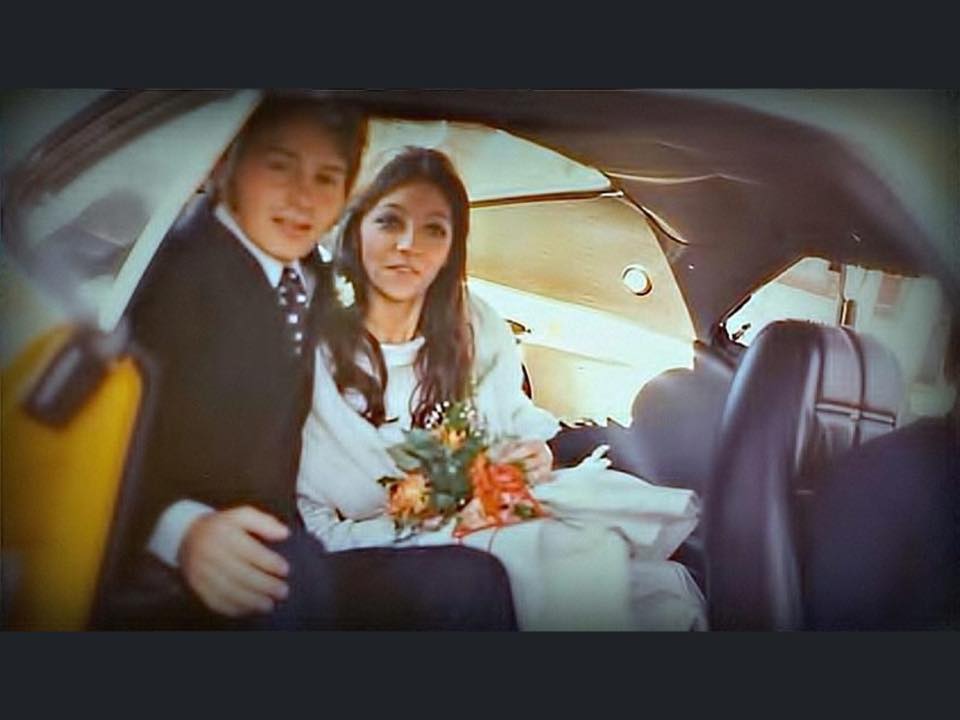 Gilles and Joann in the Mustang on their wedding day.