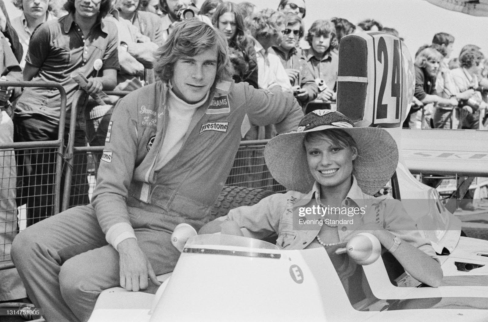 James Hunt (1947 - 1993) with his fiancée, fashion model Suzy Miller, during the 1974 British Grand Prix at Brands Hatch, UK, 20th July 1974.