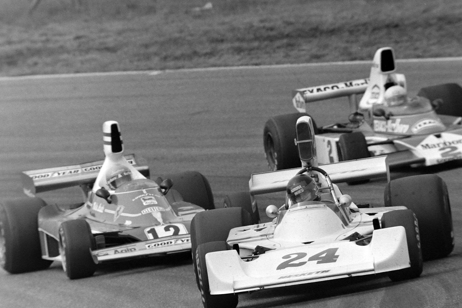 James Hunt, Hesketh, followed by Niki Lauda in a Ferrari.