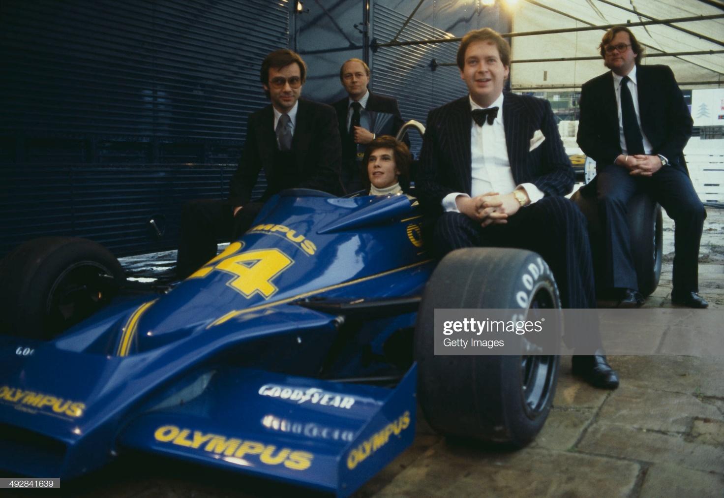 Divina Galica of Great Britain sits aboard the n. 14 Olympus Cameras Hesketh 308E Cosworth V8 as Lord Alexander Hesketh sits astride the front left tyre, at the team launch on1st January 1978 at the Silverstone Circuit in Towcester, Great Britain. 