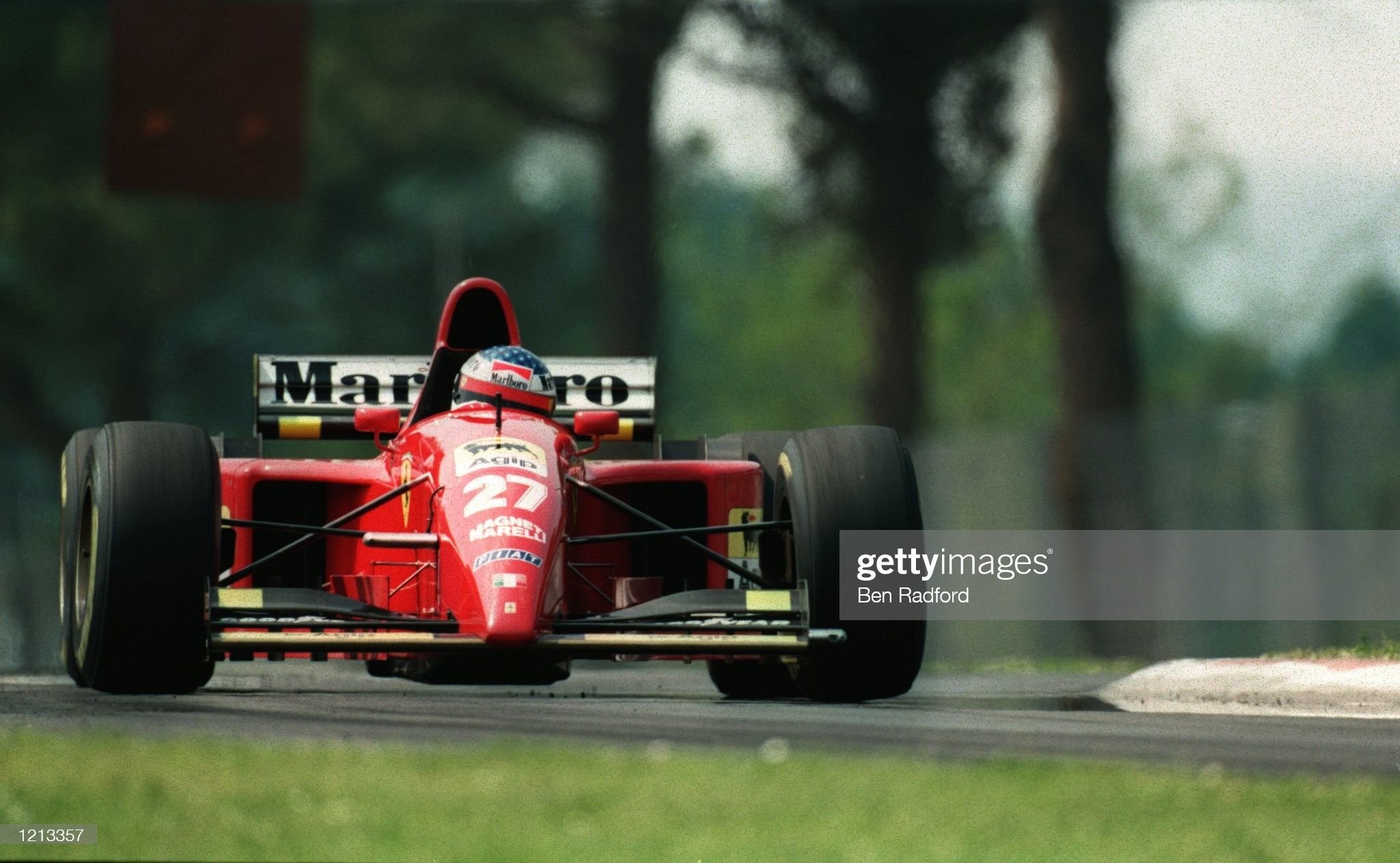 Jean Alesi drives his Ferrari during the final qualifying session in the San Marino F1 Grand Prix in Imola on 29 April 1995. 