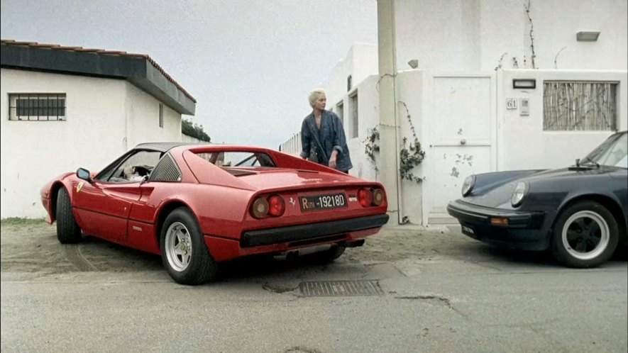 Dandi in his red Ferrari.