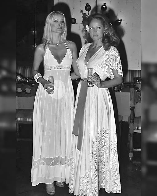 Ursula Andress and Barbara Bouchet at the White Party of Jackie O’ nightclub in 1975.