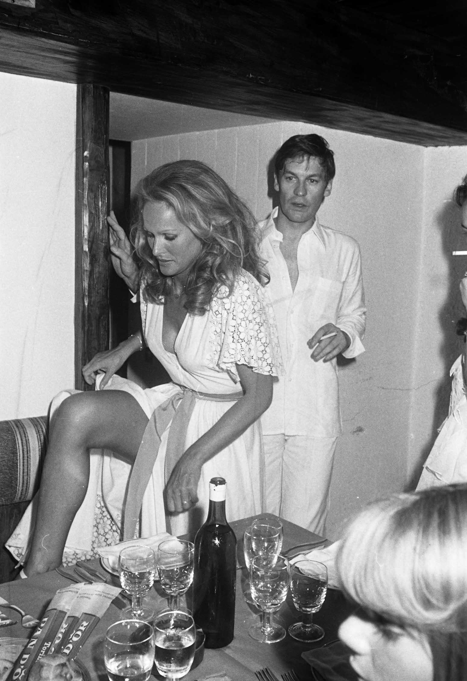 Ursula Andress and Helmut Berger in 1975.