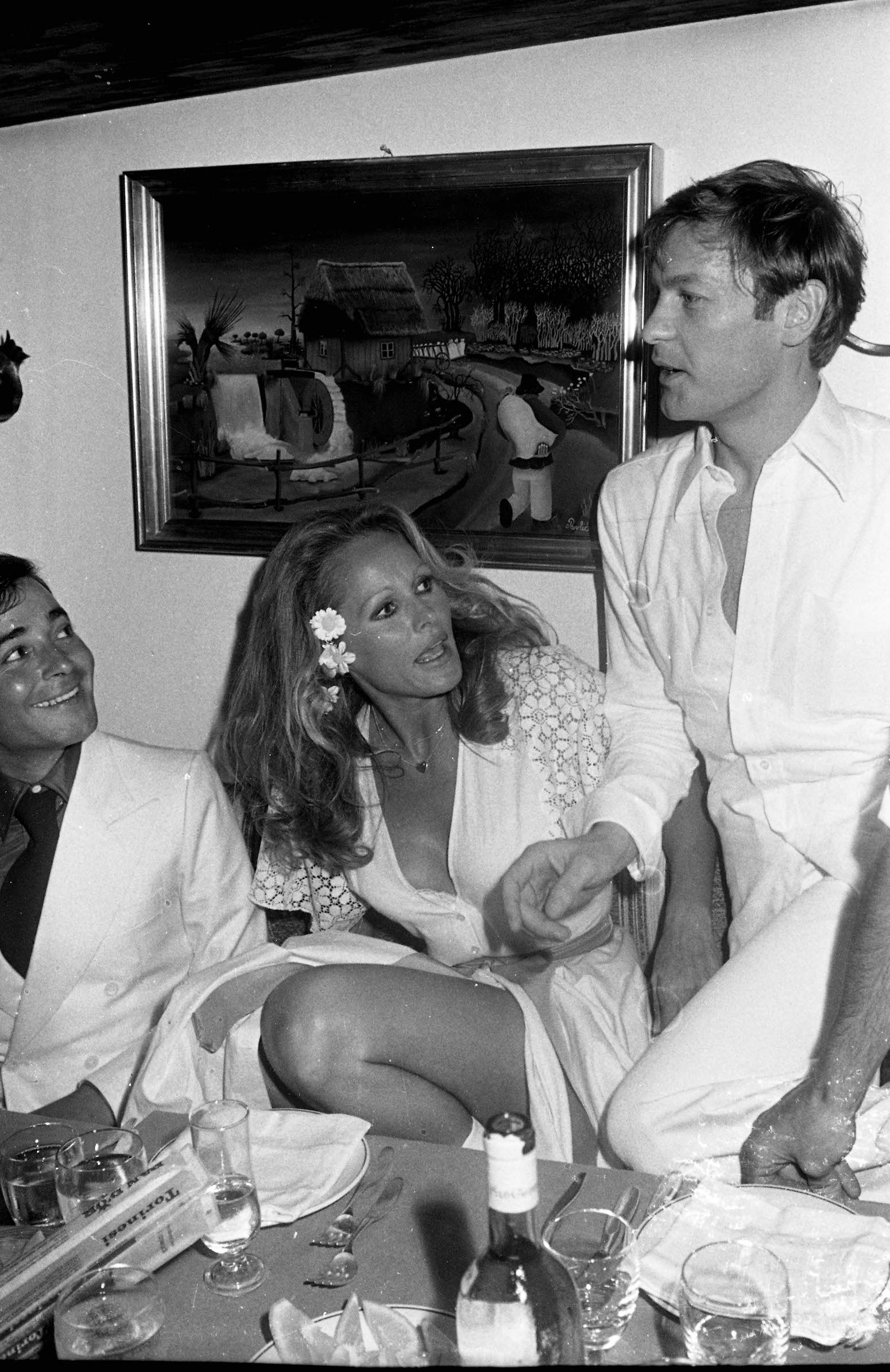 Ursula Andress and Helmut Berger in 1975.