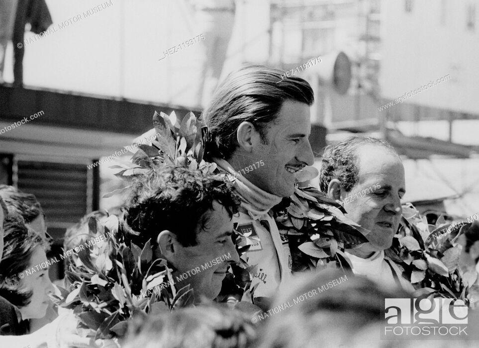 Graham Hill on the podium.