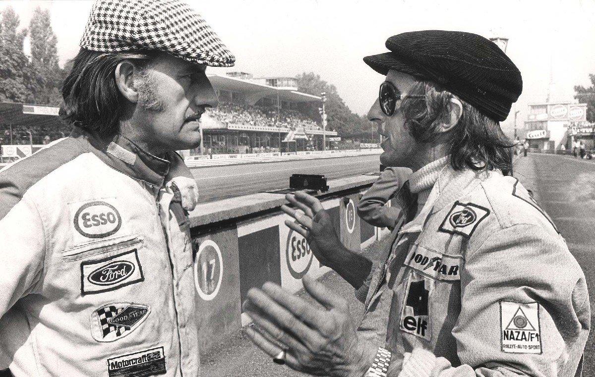Jackie Stewart with Graham Hill.