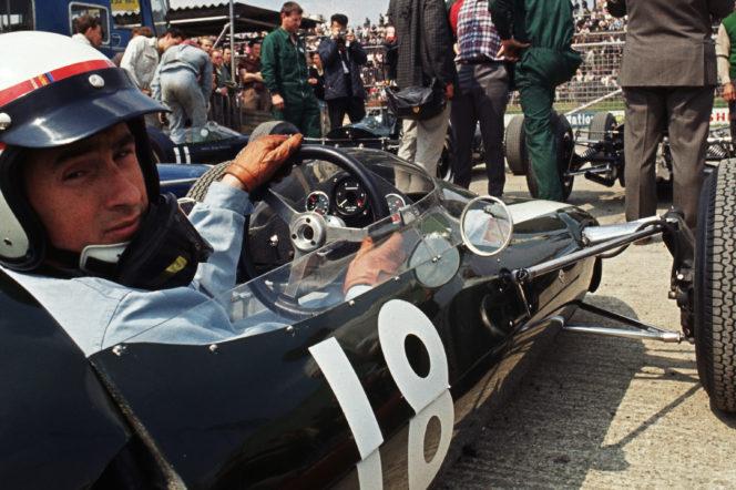 Jackie Stewart in a racing car.