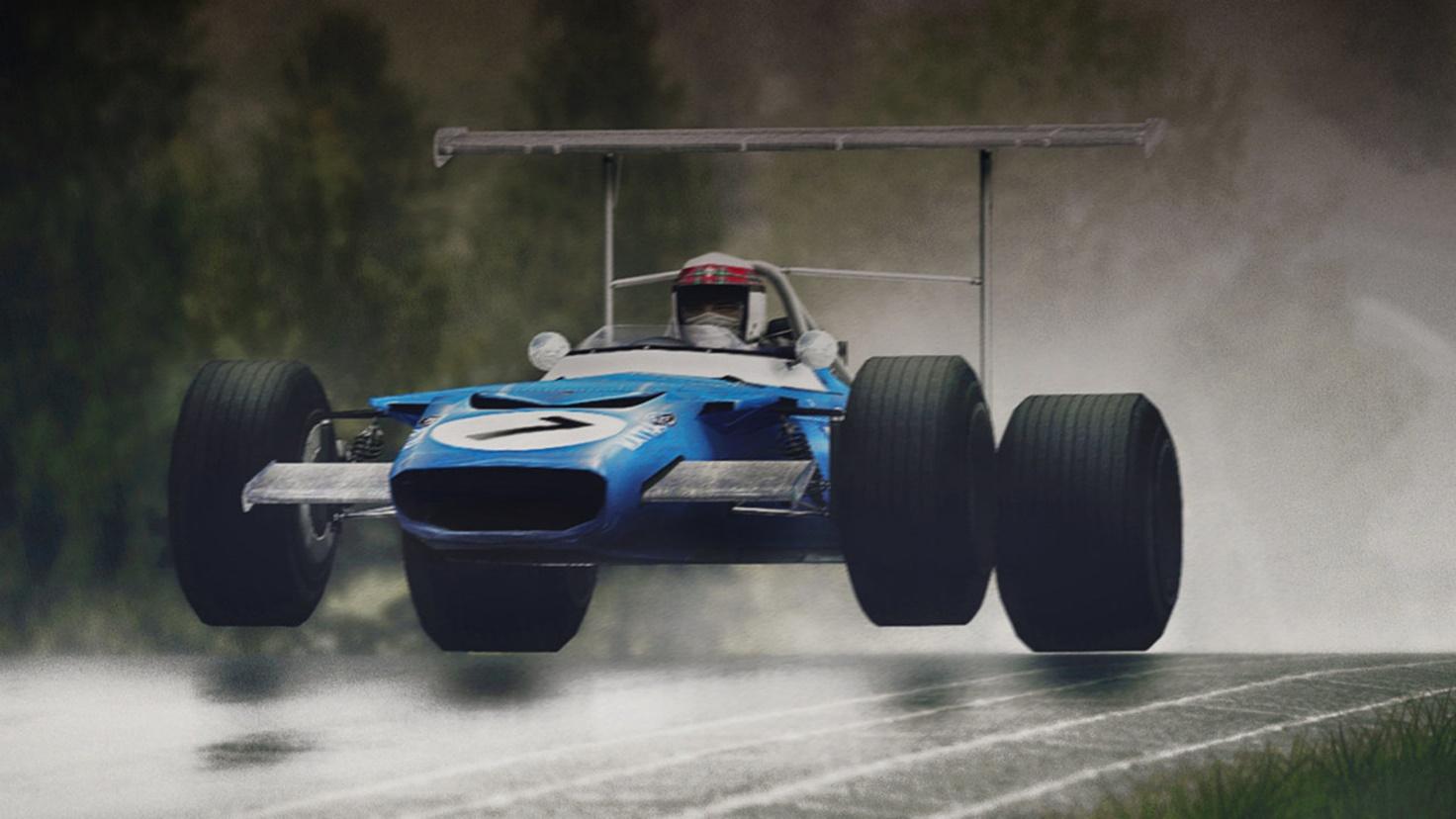 Jacky Stewart driving in the rain.