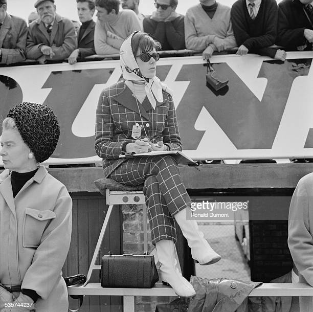 Helen Stewart, née McGregor, watching the action at Silverstone on 28 April 1967. 