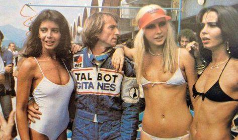 Jacques Laffite with three girls.