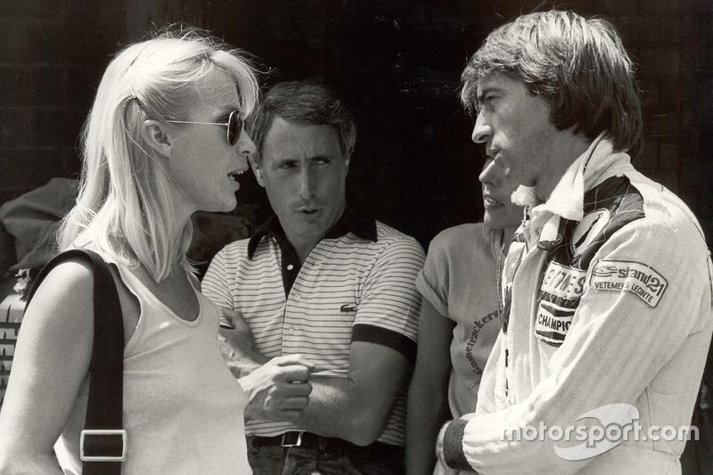 Jacques Laffite with a woman at the 1977 Swedish GP.
