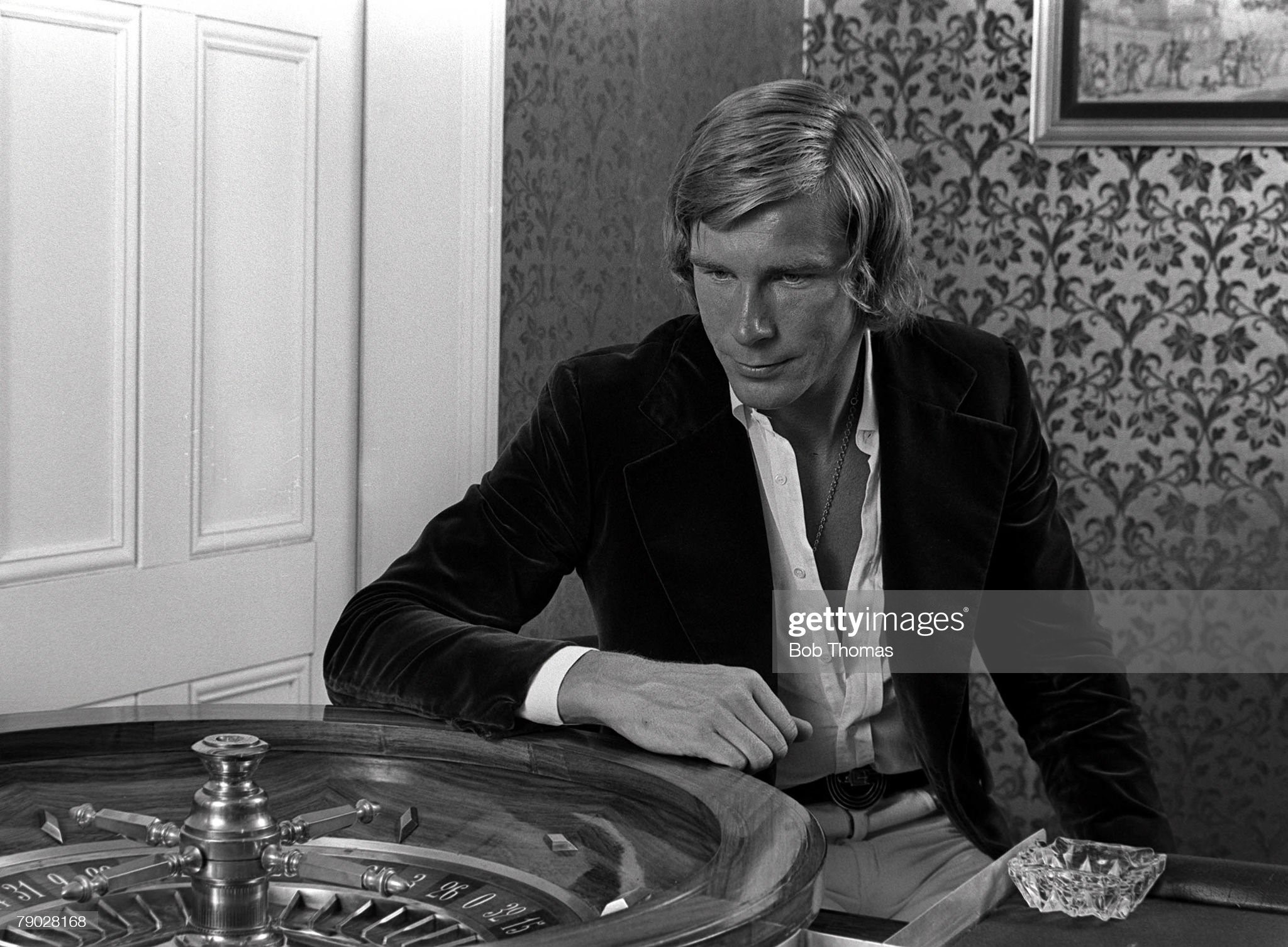 James Hunt pictured beside a roulette wheel at the Rubicon Sporting Club in Northampton, England, in 1975 or 1976. 