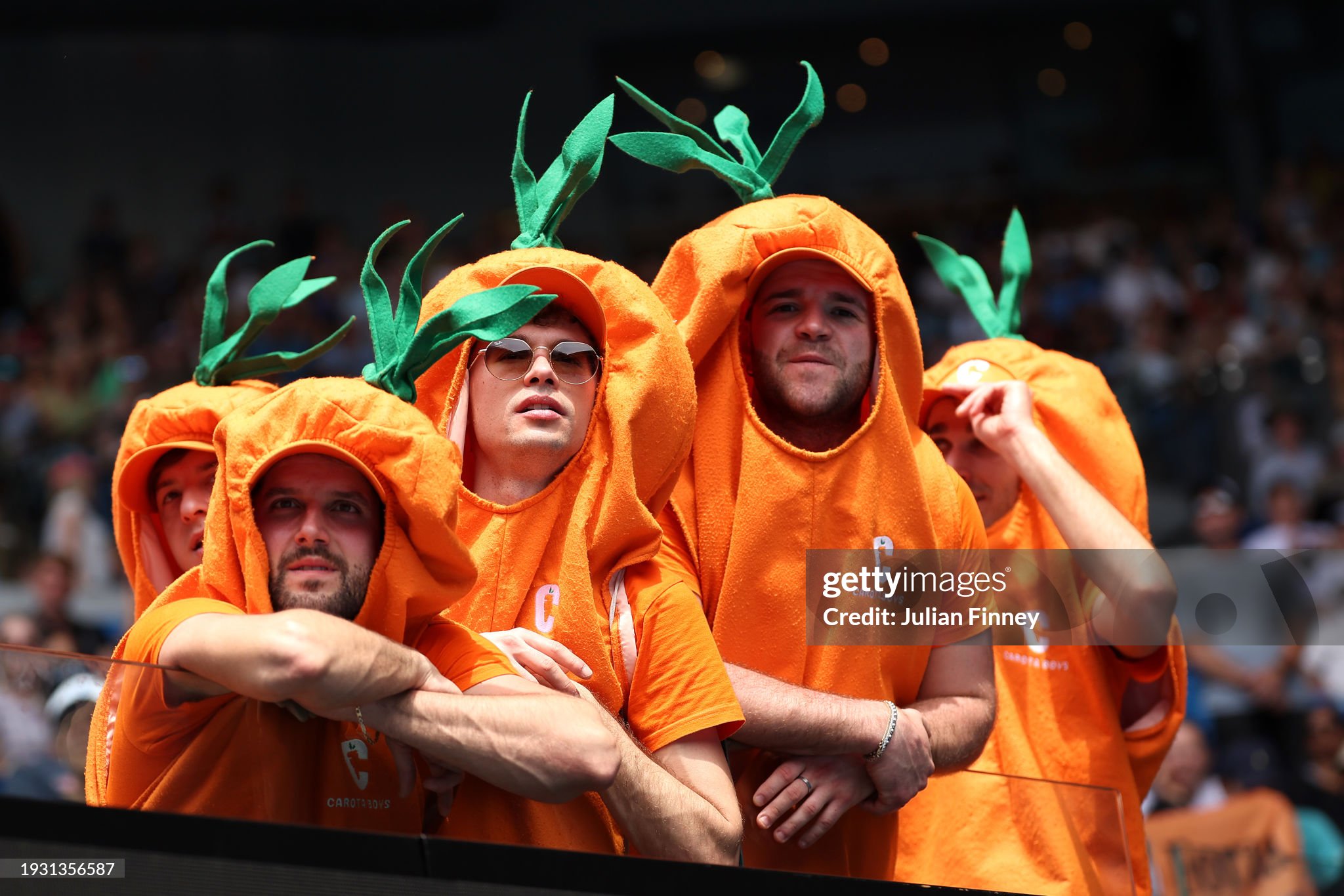 The Carota Boys show their support for Jannik Sinner during his round one singles match against Botic van de Zandschulp on day one of the Australian Open at Melbourne Park on January 14, 2024. 