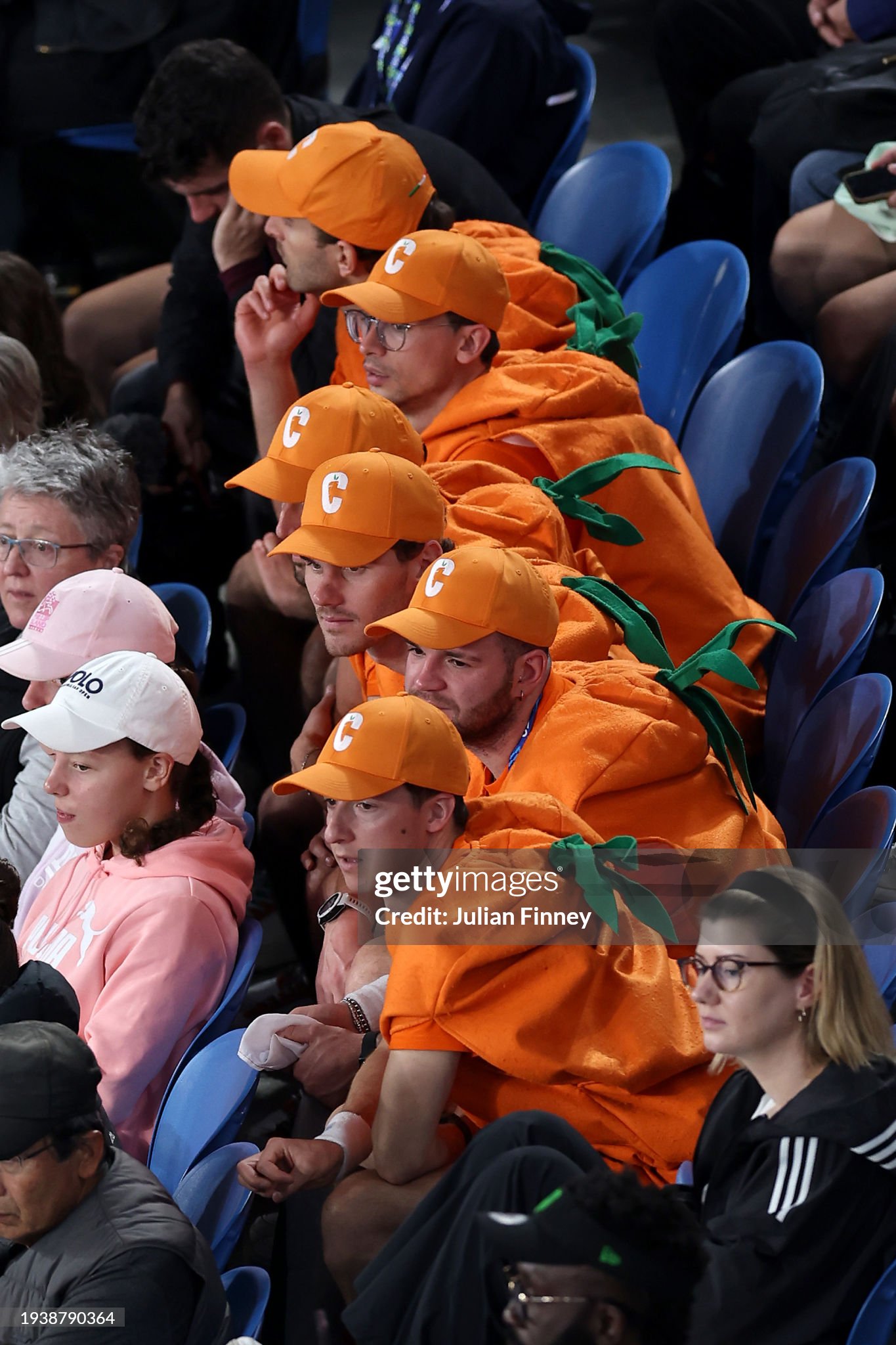 The Carota Boys show their support for Jannik Sinner during his round two singles match against Jesper de Jong at the Australian Open at Melbourne Park on January 17, 2024. 