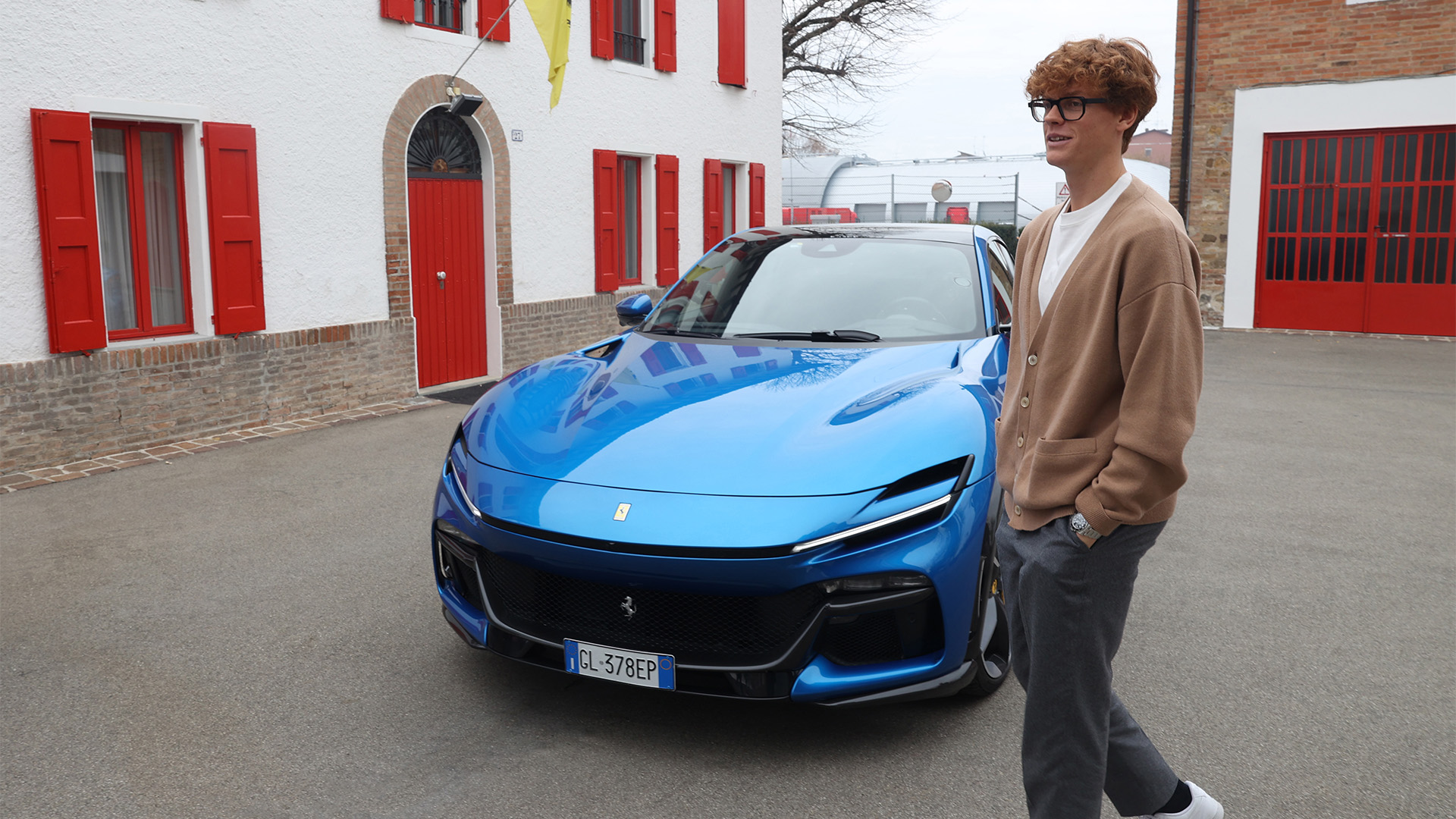 Jannik Sinner in Maranello with a Ferrari Purosangue.
