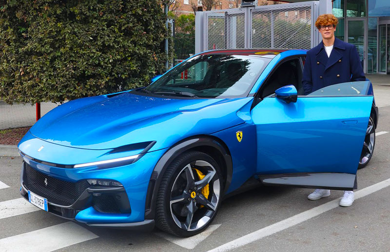 Jannik Sinner in Maranello with a Ferrari Purosangue.