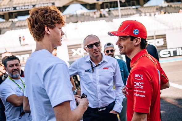 Jannik Sinner in Melbourne with Charles Leclerc and Stefano Domenicali in 2025.