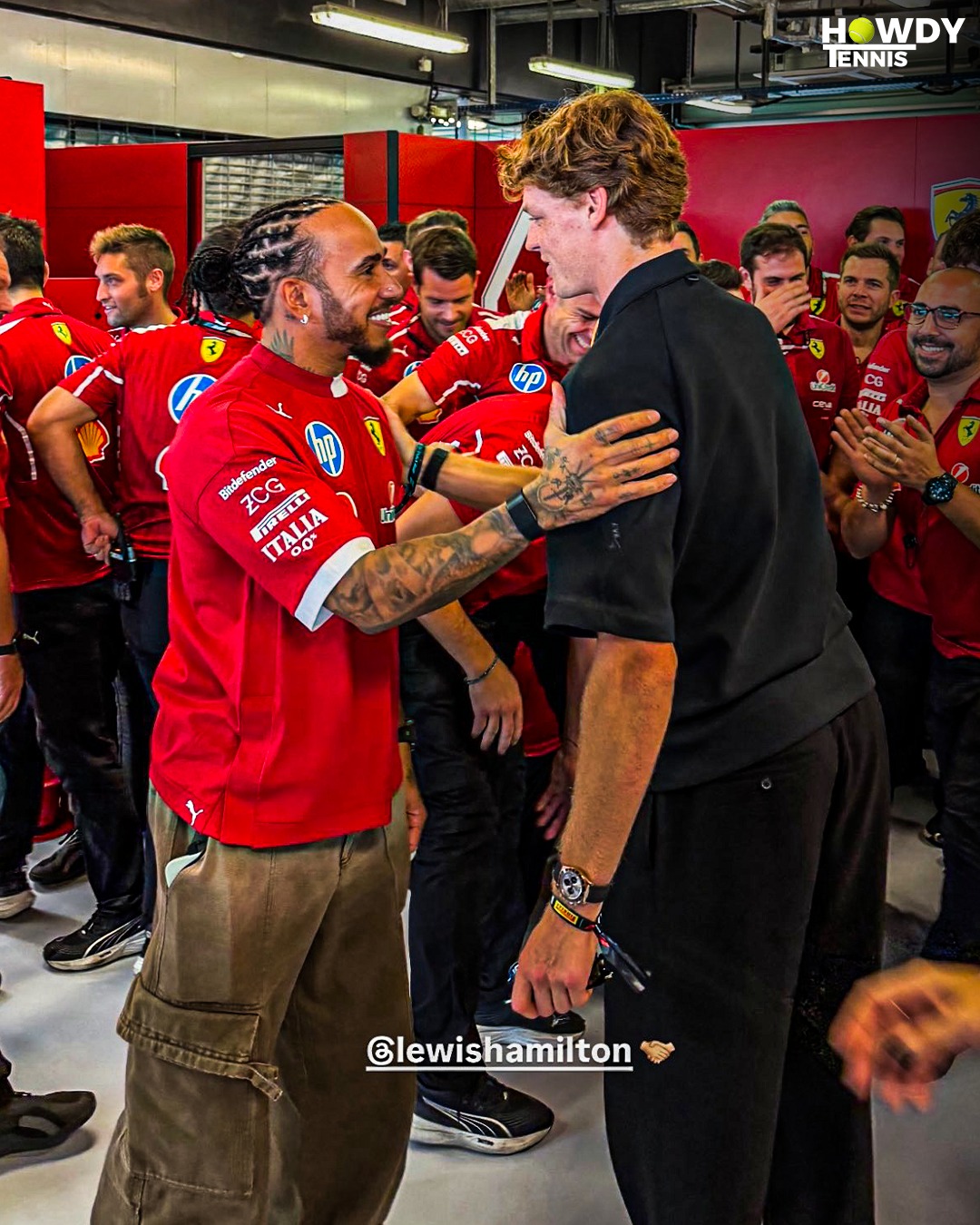 Jannik Sinner in the Ferrari garage with Lewis Hamilton in Melbourne in 2025.