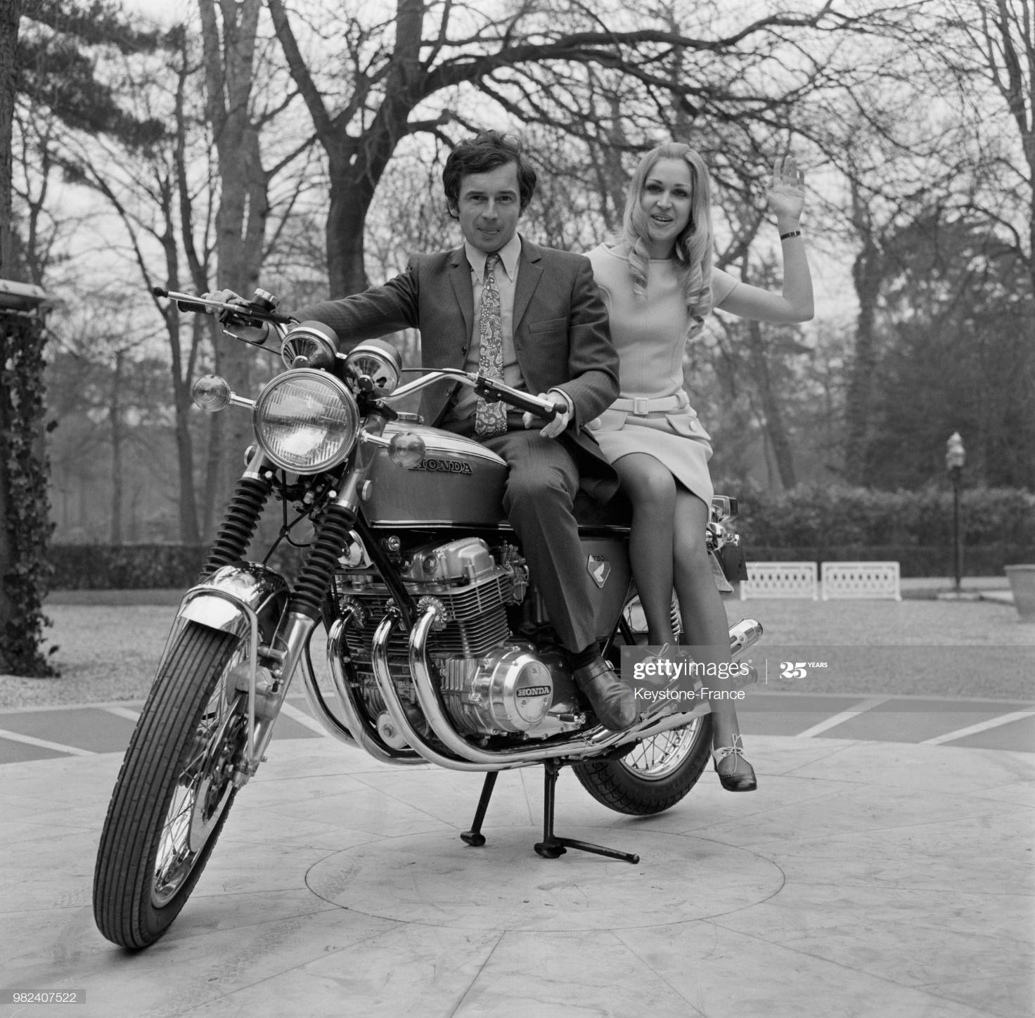 Jean Pierre on a bike with a girl.