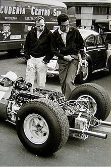 Surtees (left) and Mauro Forghieri in 1965.