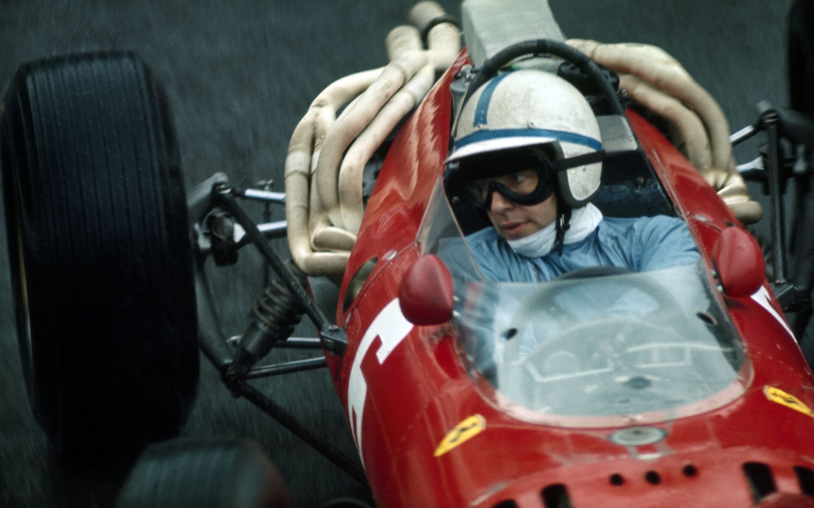 John Surtees driving a Ferrari.