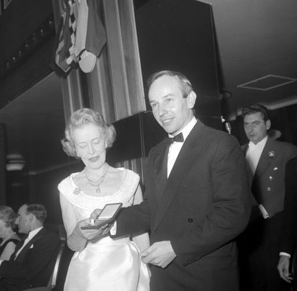 The Duchess of Richmond and Gordon presents John Surtees with the British Automobile Racing Club's Gold Medal for outstanding achievement motor racing by a British Subject.