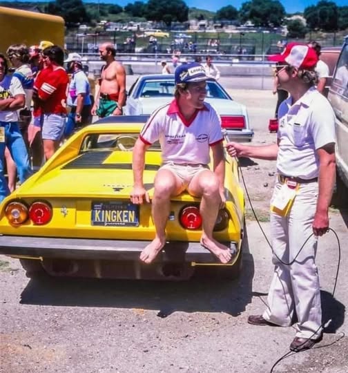 Kenny Roberts taking an interview in Malibu, California, in the coolest way ever, with his 1978 Ferrari GTS Spider with license plate ‘King Ken’.