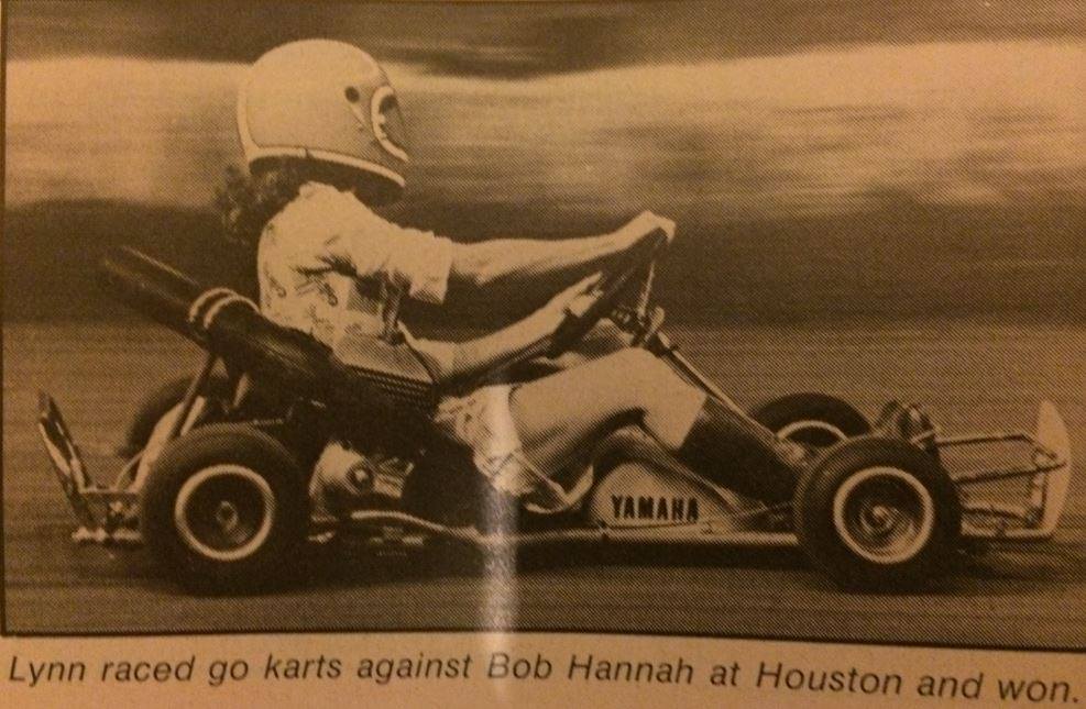 Lynn racing a go kart.