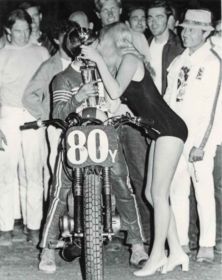 Kenny Roberts kissed by a girl.
