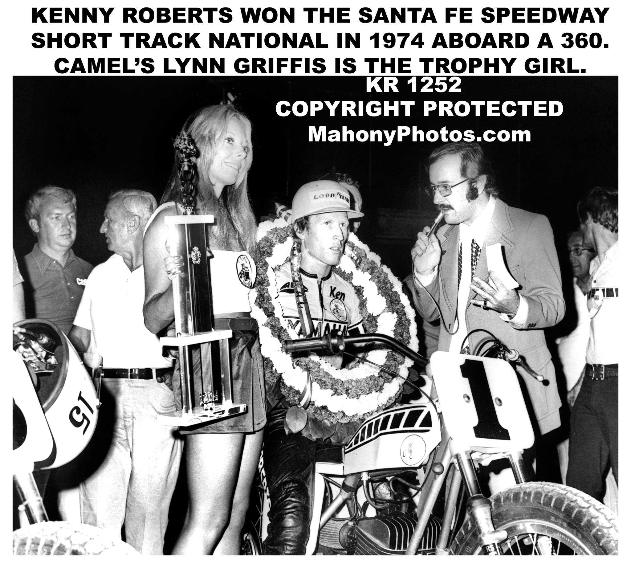Kenny Roberts won the ‘Santa Fe Speedway short track national’ in 1974 aboard a 360. Camel’s Lynn Griffis is the trophy girl. 